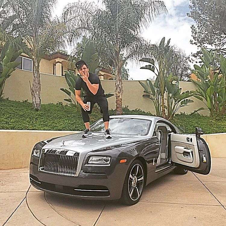 #RichKidsOfInstagram: Danny Agha Standing on His Rolls Royce Wraith Hood