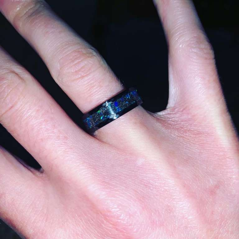 Finally got my ring in. Been waiting 3 months! Meteorite and triceratops bone.