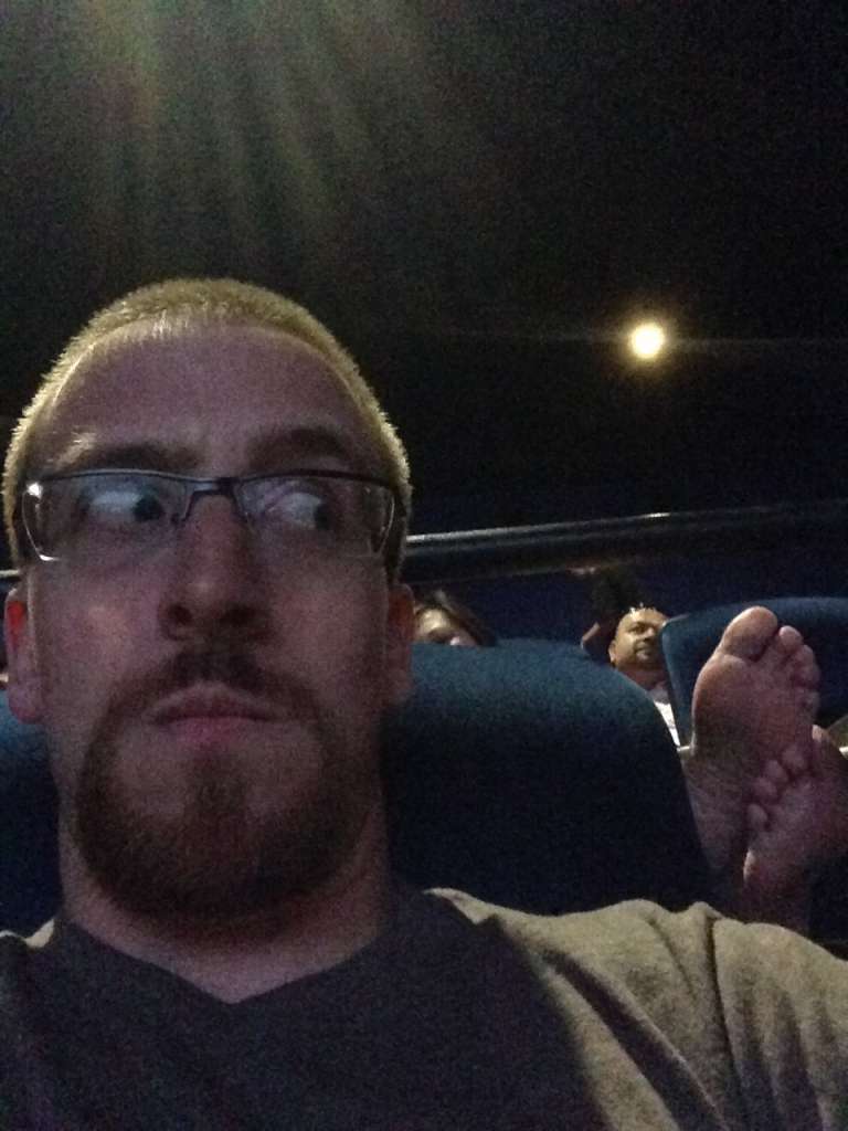 When you are in a movie theater, don't assume people wants to smell your feet