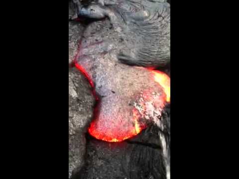 First time ever recorded on video... a dude pissing on hot flowing lava
