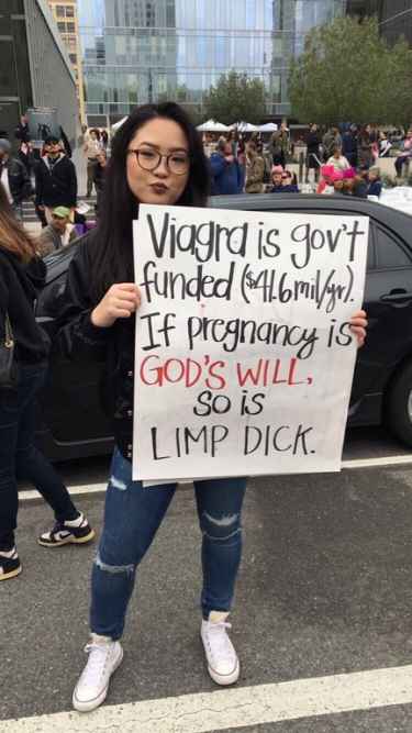 This Woman Protester Tell It as It Is.... $41.6M Yearly Defense Fund for Free Viagra to Male Members #LOL