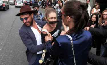 Gigi Hadid manhandled by random guy after a show for Milan Fashion Week