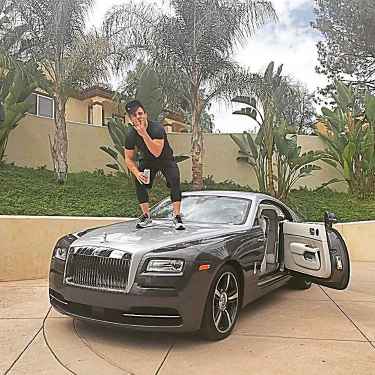 #RichKidsOfInstagram: Danny Agha Standing on His Rolls Royce Wraith Hood