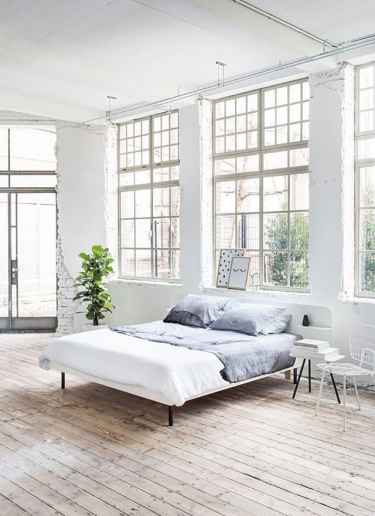 #Loft #bedroom with large windows and wood floors