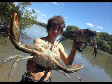 Two Aussie Teens Catch Mudcrabs Barehanded and Cook Them