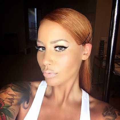 Amber Rose is unrecognizable with long hair on this Instagram photo