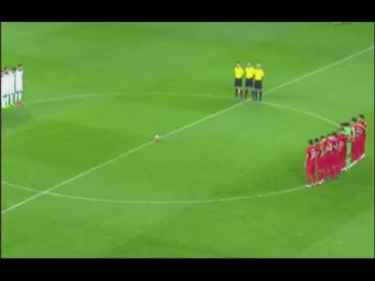Turkish football fans boo and shout "Allahu akbar" during a minute of silence for France terror victims