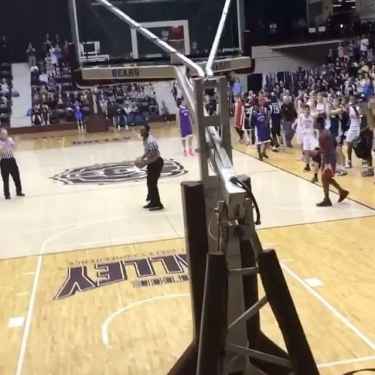 Referee Stuns Players by Throwing a Windmill Dunk