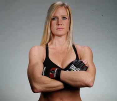 What is Holly Holm's Snapchat username?
