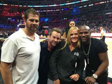 Floyd Mayweather posing with Holly Holm must be another KO for Ronda Rousey