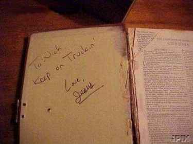 This must be fake Jesus signature, the book doesn't look that old...