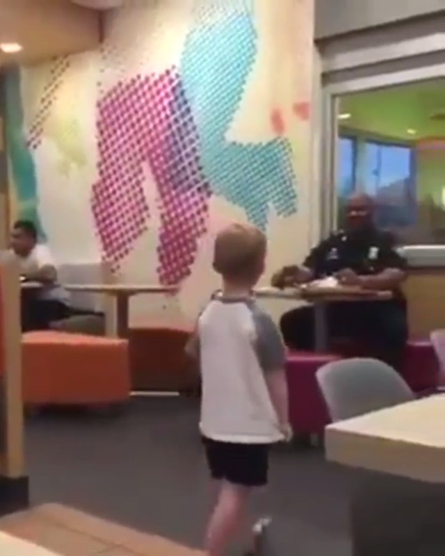 This little kid asked his mom if he could go hug the police officer