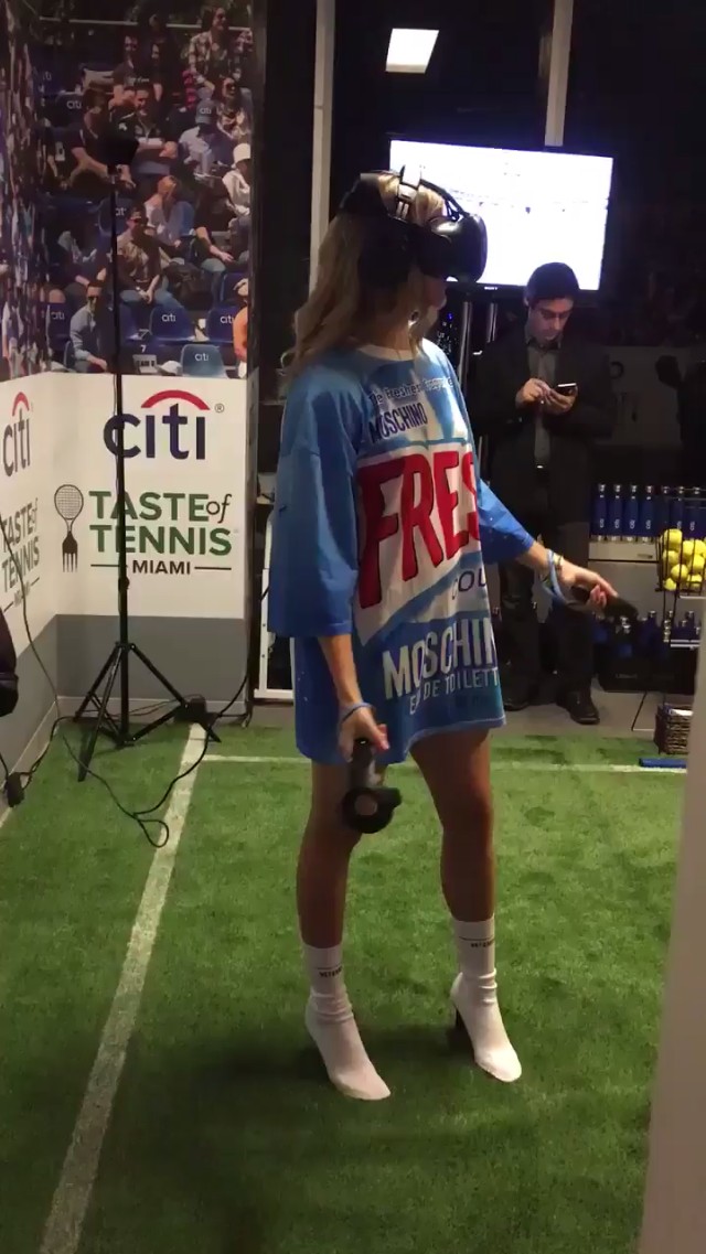 The beautiful tennis pro Genie Bouchard plays VR tennis in heels ❤️